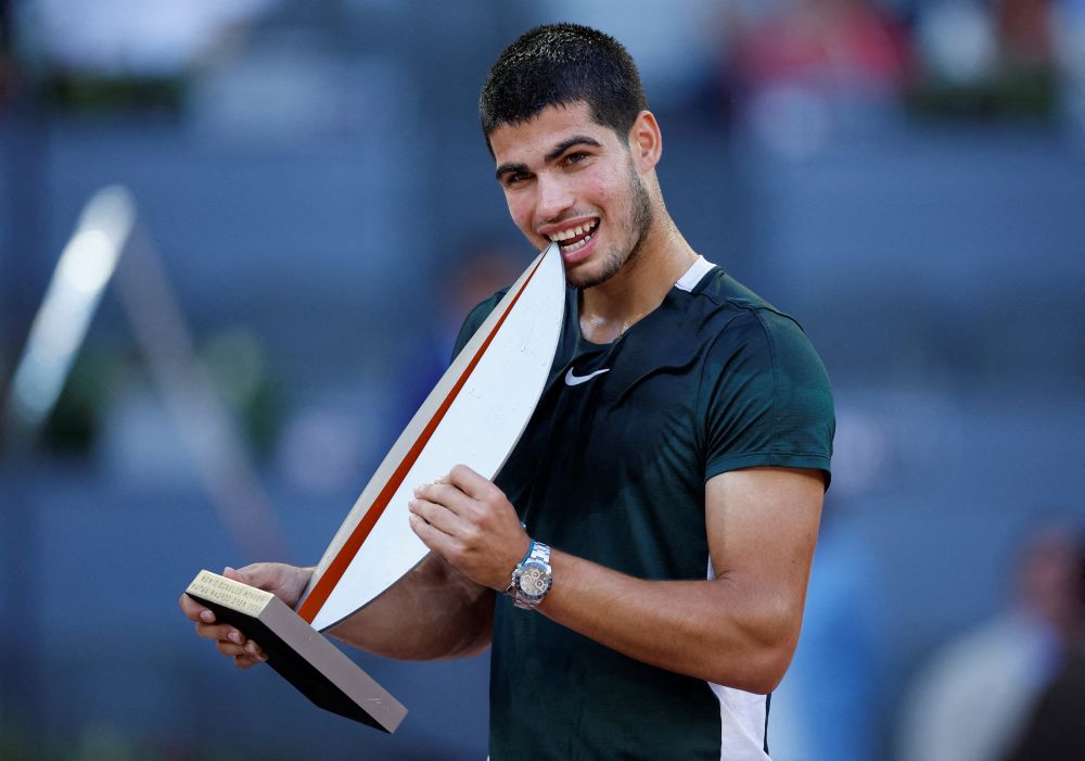Spain's Carlos Alcaraz Garfia poses with the trophy after winning the Madrid Open final against Germany's Alexander Zverev at Caja Magica, Madrid May 8, 2022. u00e2u20acu201d Reuters pic