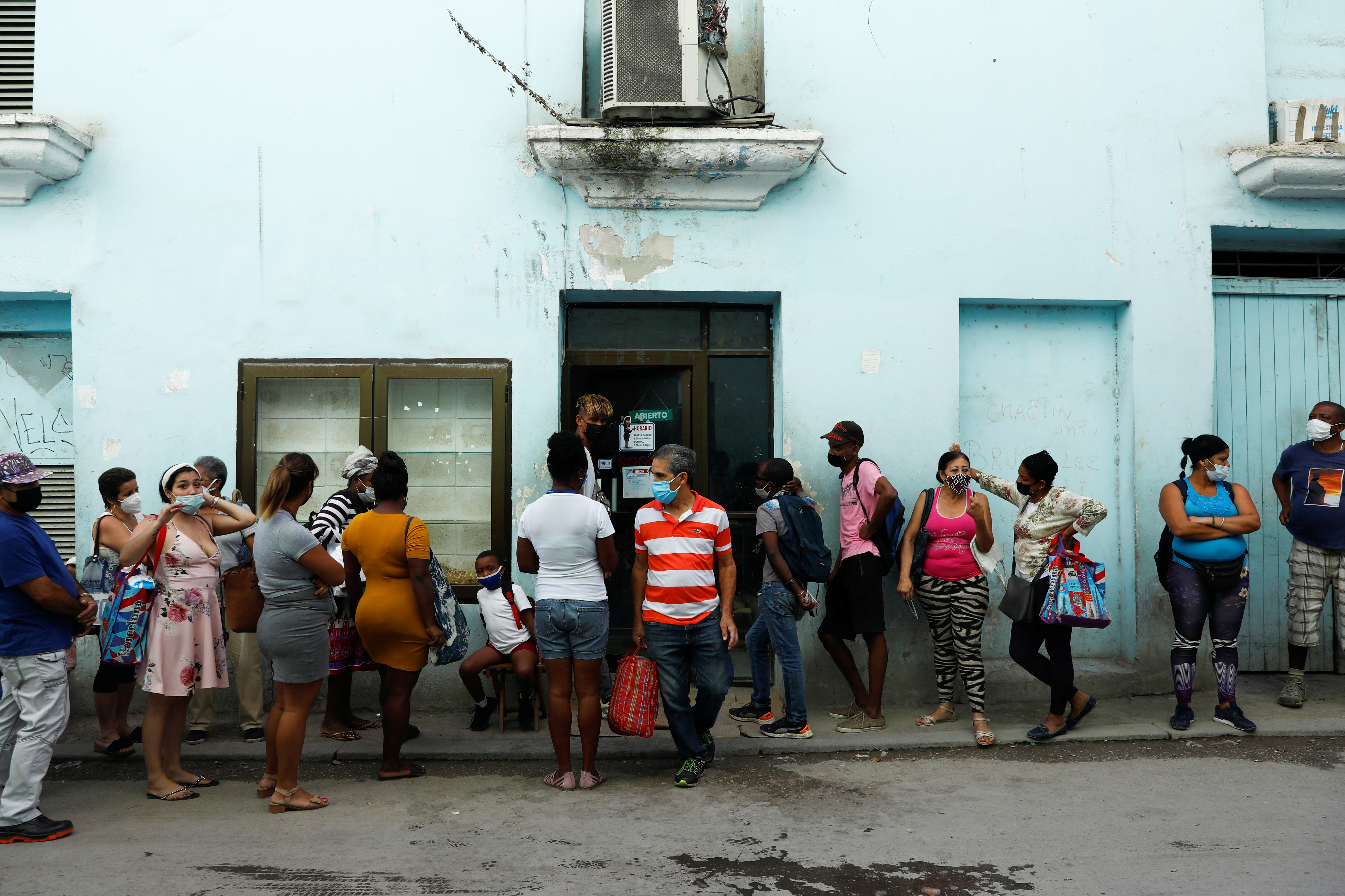 People line up to buy food in downtown Havana, Cuba, March 1, 2022. u00e2u20acu201d Reuters pic