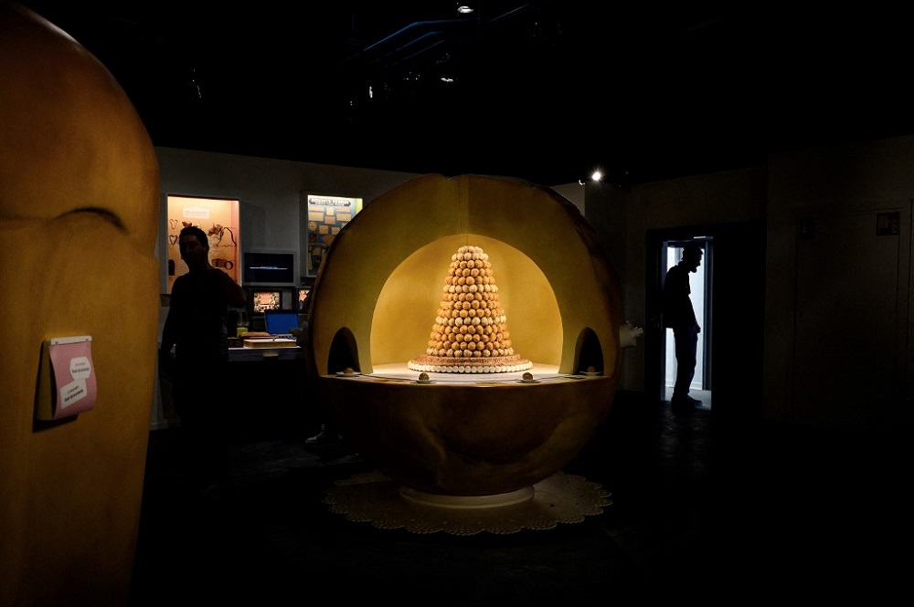 People work in an exhibition of the new Citu00c3u00a9 Internationale de la Gastronomie et du Vin, on May 5, 2022 in Dijon, on the eve of its official opening. u00e2u20acu2022 AFP pic