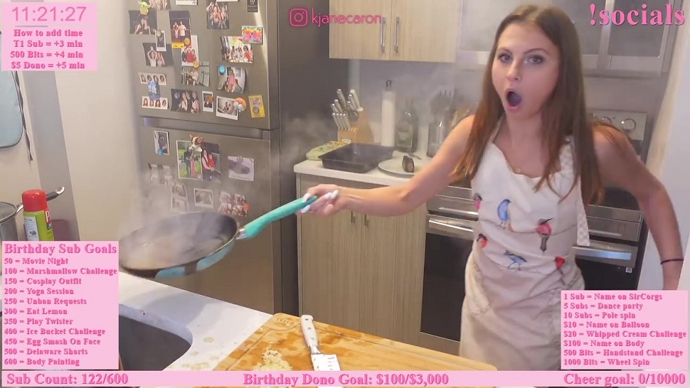Caron standing in shock after the flames died out. ― Screenshot via YouTube/ TwitchClips