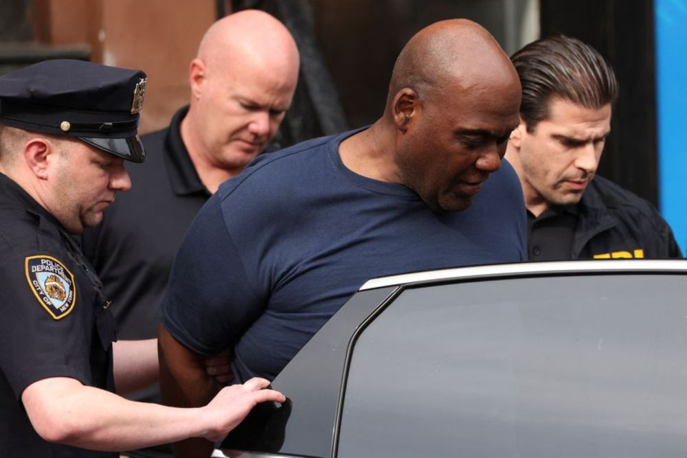 Frank James, the suspect in the Brooklyn subway shooting enters a car outside a police precinct in New York City, New York, US, April 13, 2022. u00e2u20acu201d Reuters pic