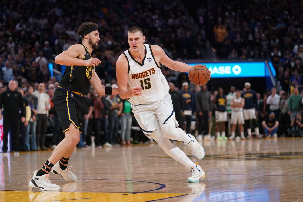 Denver Nuggets center Nikola Jokic (15) dribbles past Golden State Warriors guard Klay Thompson (11) during the 2022 NBA playoffs at the Chase Centre in California April 27, 2022. u00e2u20acu201d Reuters pic