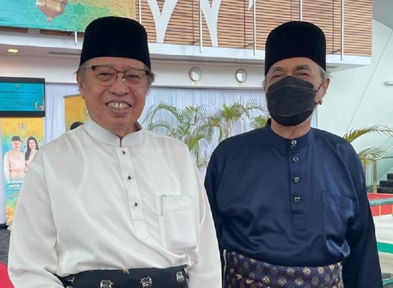 Abang Johari (left) with PBB permanent chairman Datuk Amar Mohd Asfia Awang Nassar seen at the festive open house at BCCK. u00e2u20acu201d Borneo Post Online pic