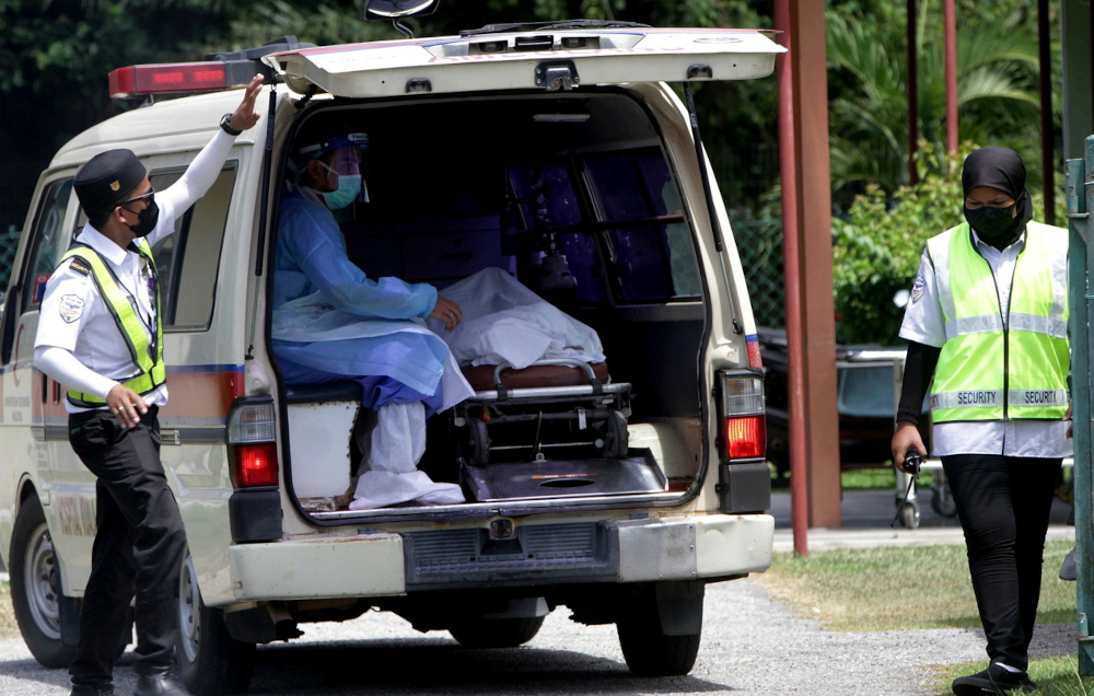 The body of one of the students killed in the North-South Expressway crash near Kuala Kangsar, arrives at Hospital Kuala Kangsaru00e2u20acu2122s Forensic Unit, May 12, 2022. u00e2u20acu201d Bernama pic 