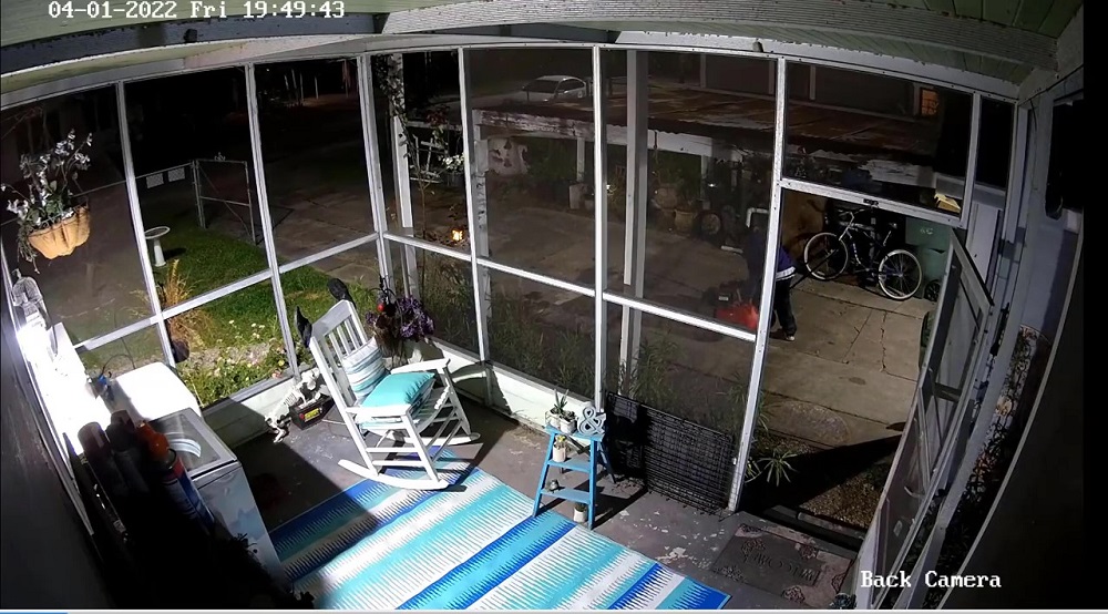 CCTV footage shows the man casually strolling in to begin his stealthy yardwork. ― Screenshot via Facebook/ Port Arthur Police Department