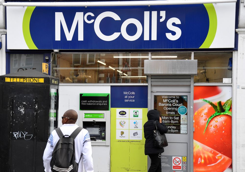 People enter a McColl's convenience store in London, Britain, May 6, 2022. u00e2u20acu201d Reuters pic