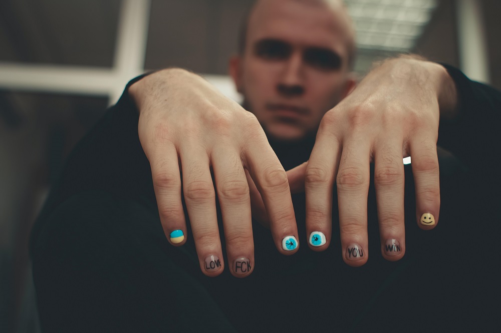 Men (too) are now embracing painted and perfectly manicured nails, shattering gender stereotypes. u00e2u20acu2022 Unsplash pic