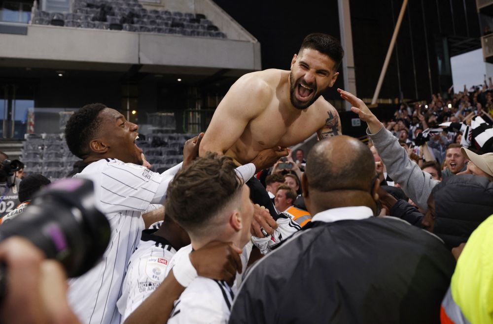 Fulham's Aleksandar Mitrovic with fans after winning the Championship at Craven Cottage, London May 2, 2022. u00e2u20acu201d Reuters pic