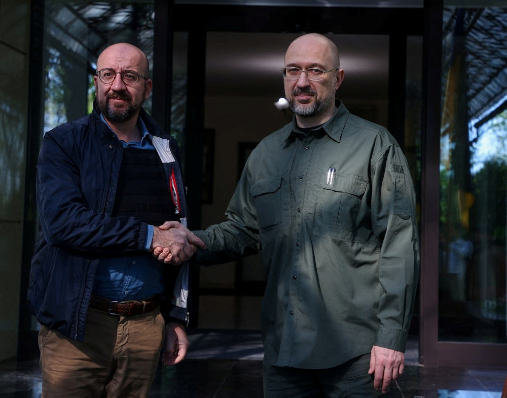 European Council President Charles Michel and Ukrainian Prime Minister Denys Shmyhal pose for a picture before their meeting, as Russiau00e2u20acu2122s attack on Ukraine continues, in Odessa May 9, 2022. u00e2u20acu201dUkrainian Governmental Press Service pic via Reuters 