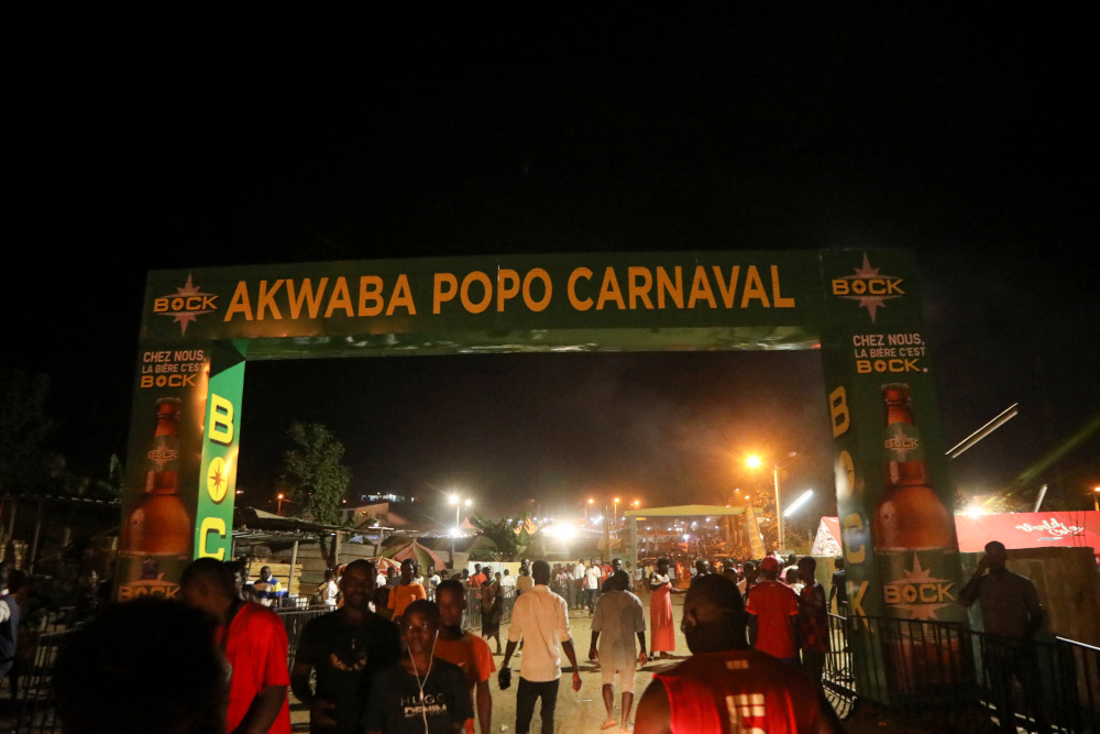 People walk at the entrance of the Popo Carnival village in Bonoua, Ivory Coast April 30, 2022. — Reuters pic