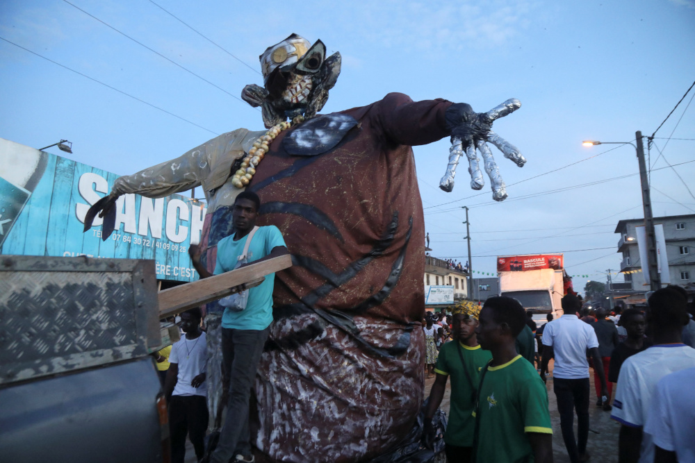 A giant puppet representing King Popo is carried during a parade in the Popo Carnival in Bonoua, Ivory Coast April 30, 2022. u00e2u20acu201d Reuters pic