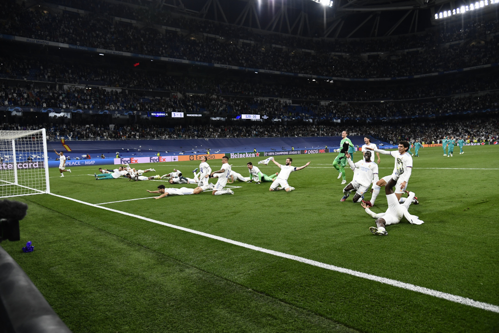 Real Madrid players celebrate victory after the Uefa Champions League Semi Final Leg Two match between Real Madrid and Manchester City in Madrid May 4, 2022. u00e2u20acu201d Jose Breton/Pics Action/NurPhoto pic via Reuters 