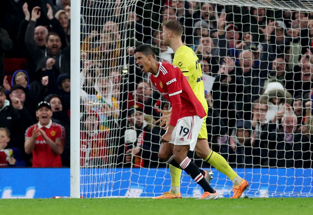 Manchester United's Raphael Varane celebrates scoring their third goal against Brentford at Old Trafford, Manchester May 2, 2022. u00e2u20acu201d Reuters picn