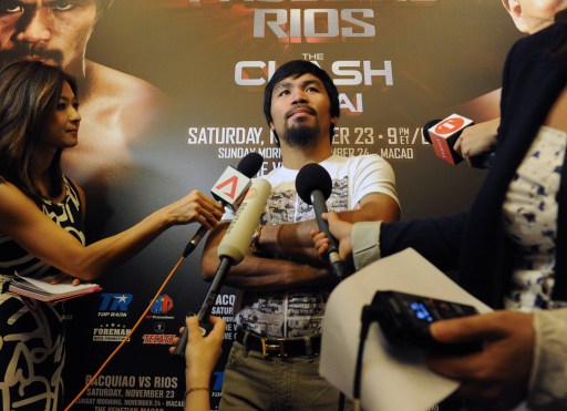 Philippine boxing icon Manny Pacquiao speaks to the media at Marina Bay Sands in Singapore on August 2, 2013. u00e2u20acu201d AFP pic
