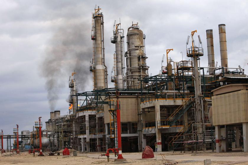 A general view shows an oil refinery in Zawia, 55km west of Tripoli.  A mix of militias, tribesmen and civil servants are demanding political rights or a greater share of Libya's oil wealth, have occupied several oilfields and ports, cutting exports to 11