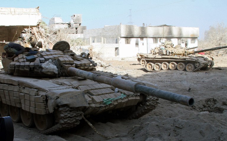Syrian army tanks are seen deployed in the Jobar neighbourhood of Damascus on August 24, 2013. u00e2u20acu201d AFP pic