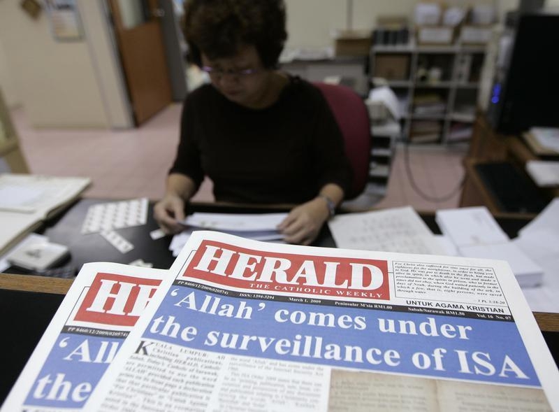 'Herald, the Catholic Weekly,' is seen on the table at its office in Kuala Lumpur February 27, 2009. u00e2u20acu201d Reuters pic