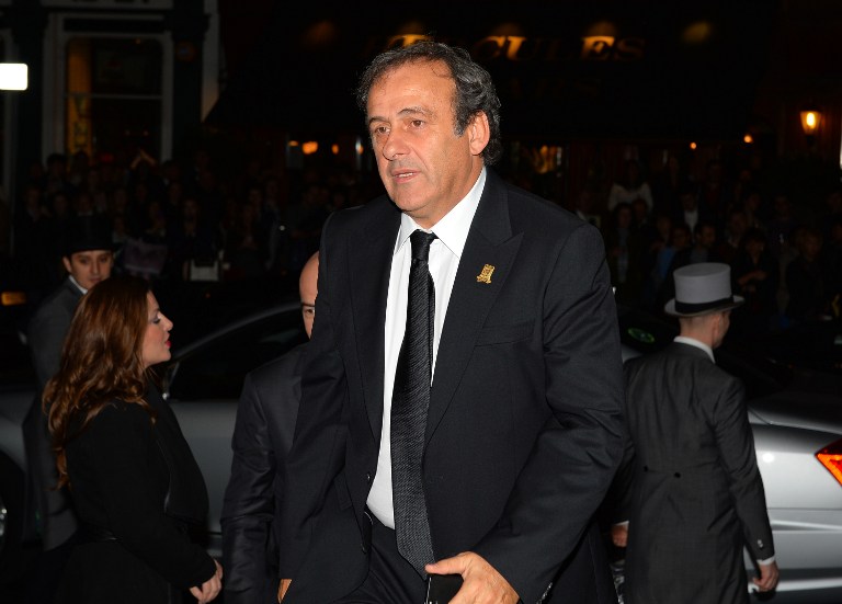 UEFA president Michel Platini arrives to attend The Football Association's 150th Anniversary Gala Dinner at the Grand Connaught Rooms in central London on October 26, 2013. u00e2u20acu201d AFP pic