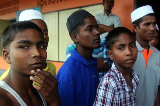 Migrants from Myanmar's Muslim-minority Rohingya at a detention centre after they were rounded up in raids on hidden camps in Thailand's southern province of Narathiwat on January 16, 2013.u00e2u20acu201d AFP pic