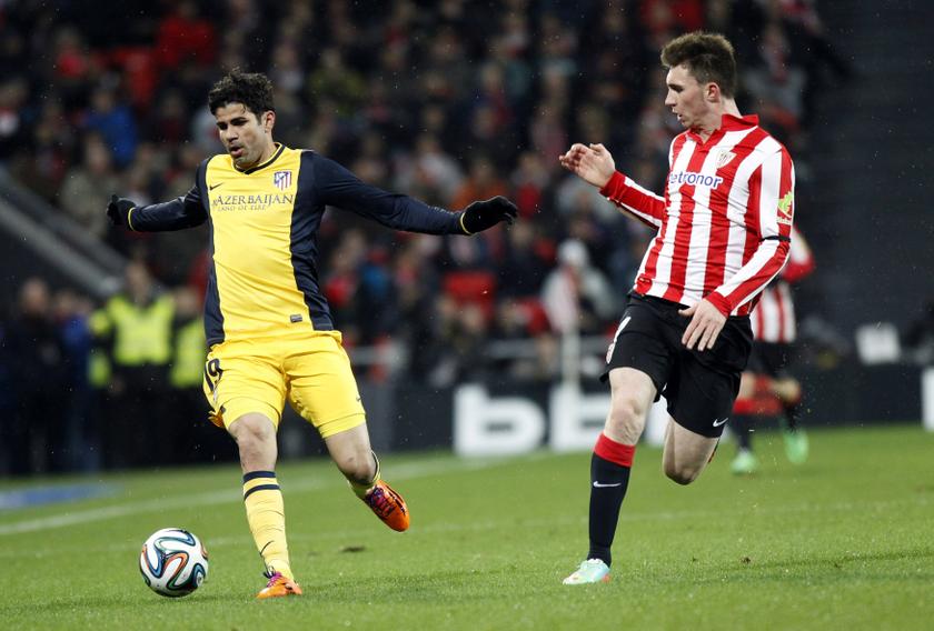 Atletico Madridu00e2u20acu2122s Diego Costa (left) fights for the ball with Athletic Bilbaou00e2u20acu2122s Aymeric Laporte during their Spanish Kingu00e2u20acu2122s Cup soccer match at San Mames stadium in Bilbao, January 29, 2014. u00e2u20acu2022 Reuters pic