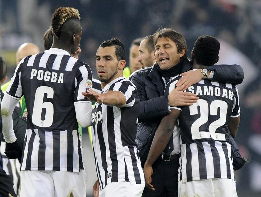 Juventusu00e2u20acu2122 coach Antonio Conte (second from right) celebrates with his players, at the end of their Italian Serie A football match against Inter Milan at Juventus Stadium in Turin, February 3, 2014. u00e2u20acu2022 Reuters pic
