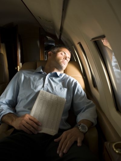 Business travelers are increasingly disconnecting during their flights to relax and strike a balance between work and play says a new survey. u00e2u20acu201d AFP-Relaxnews pic