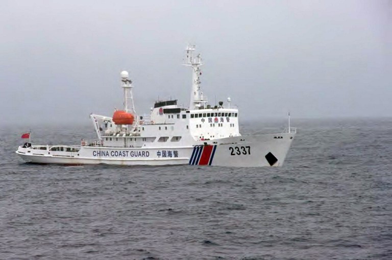 A Chinese Coast Guard ship cruising near the disputed islets in the East China Sea on Nov 2, 2013. Japan today stationed four unarmed missiles on an island that sits on the gateway to the Pacific. u00e2u20acu201d AFP pic