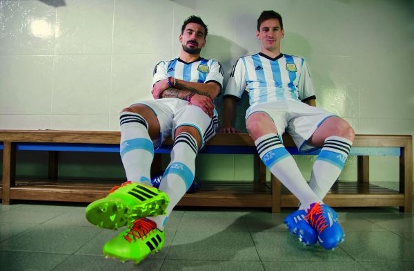 Ezequiel Lavazzi and Leo Messi in the new Argentina kit by Adidas. u00e2u20acu201d AFP pic
