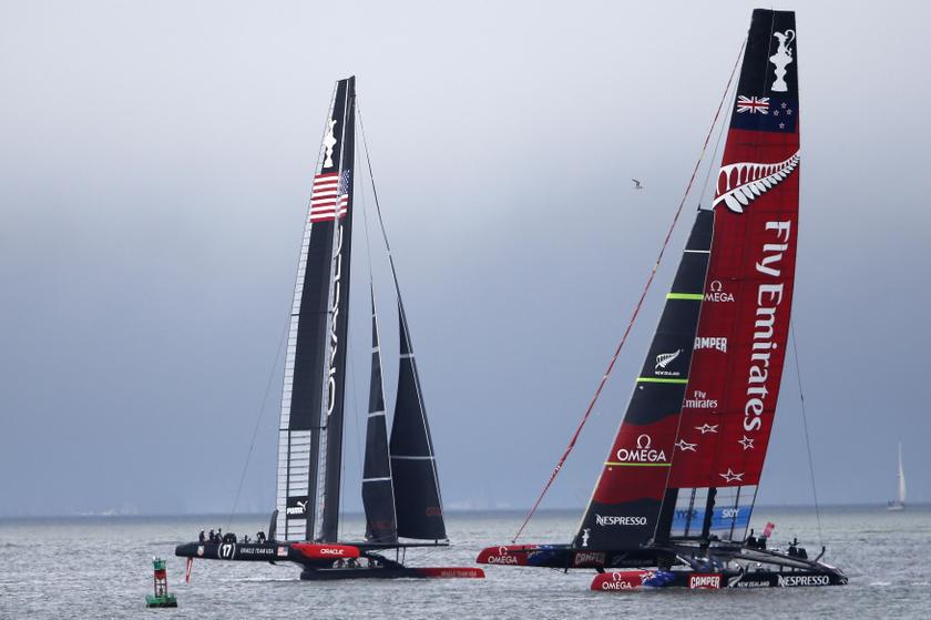 Oracle Team USA (left) sails against Emirates Team New Zealand (right) during Race 13 of the 34th America's Cup yacht sailing race in San Francisco, California September 20, 2013. u00e2u20acu201d Reuters pic