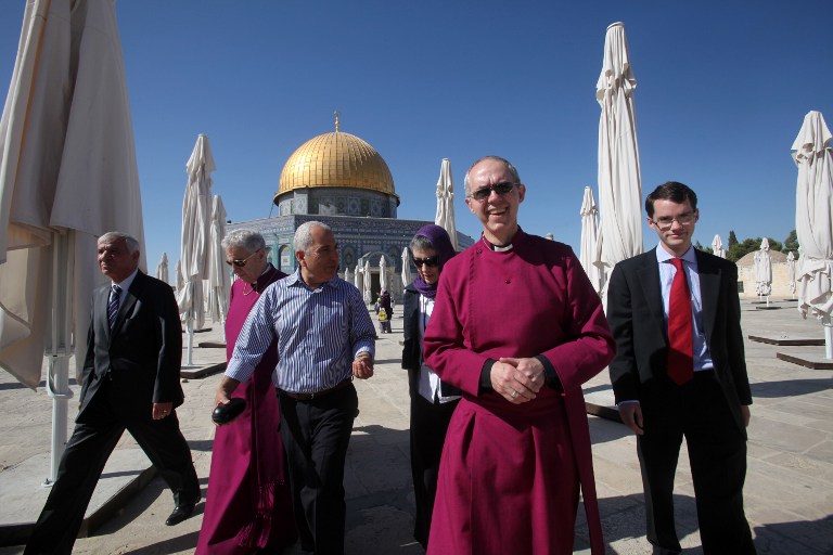 Archbishop of Canterbury Justin Welby (C-R), the spiritual leader of the Church of England, tours the al-Aqsa mosque compound in Jerusalem's Old City on June 27, 2013.u00c2u00a0u00e2u20acu201du00c2u00a0AFP pic