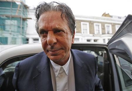Art collector Charles Saatchi arrives at his home in west London June 18, 2013. u00e2u20acu201c AFP pic
