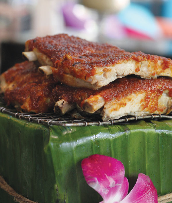 Issaya’s baby back ribs glazed with house-blended chili paste are so tender they literally fall off the bone