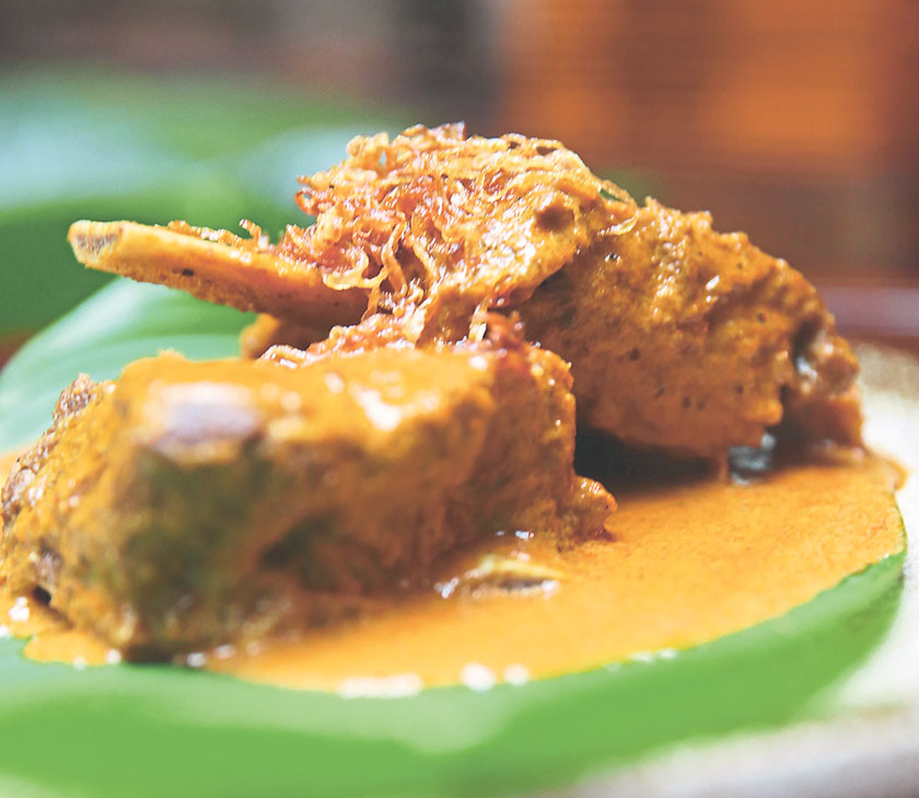 Dig into the delicious opor rusuk or tender beef ribs topped with a creamy aromatic curry