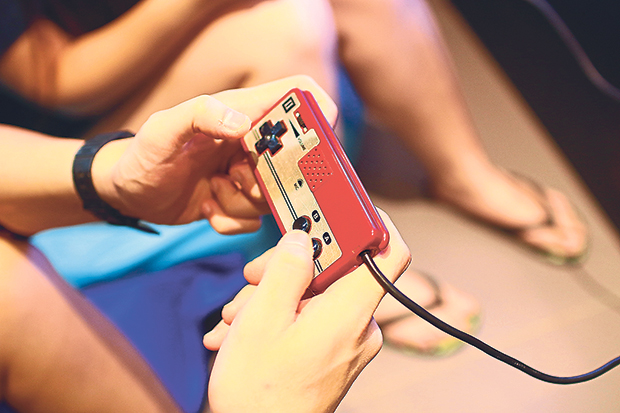 Old-school game console controller at the Play Pixels event