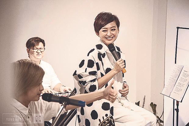 At Awegallery, a local artiste gives a music performance for the attendees