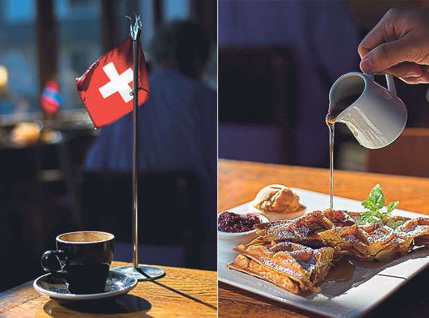 Flags from different nations accompany your orders at Addington Coffee Co-op (left). The Buttermilk Waffles (with Kohu Rd ice-cream and berry compote) at Addington Coffee Co-op is delicious (right)