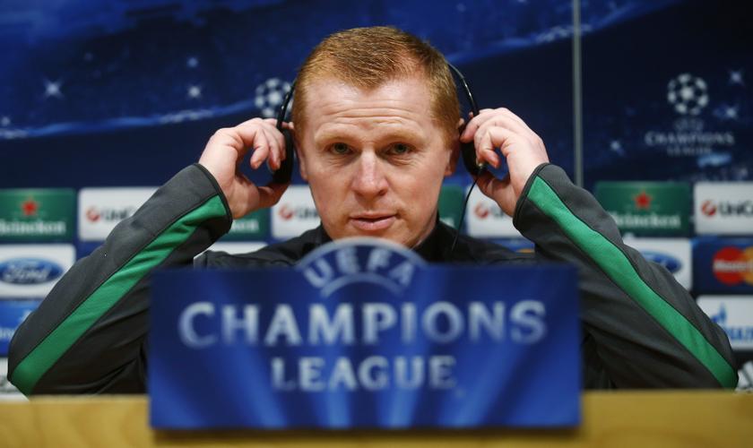 File photograph shows Celticu00e2u20acu2122s manager Neil Lennon adjusting his headphones during a news conference at Camp Nou stadium in Barcelona, December 10, 2013. -- Reuters pic