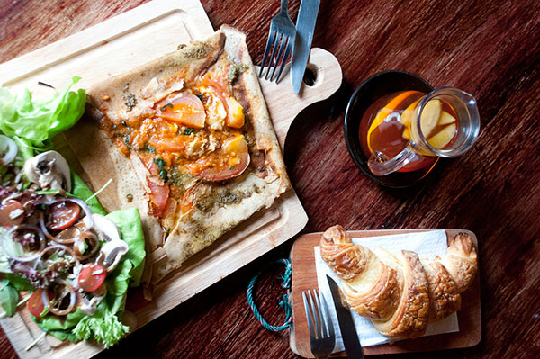 A French meal of gallete with a croissant and fruit tea at La Boheme.