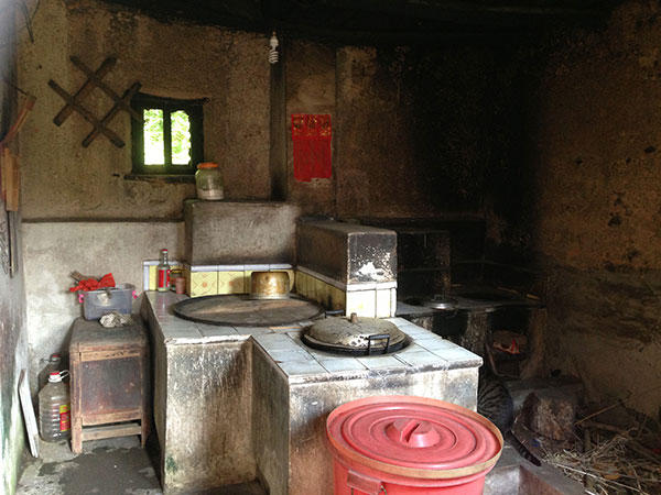 The kitchen... up till this day, firewood is used for cooking.
