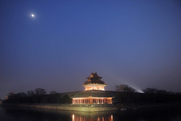 The moon shining over the Turret of Palace Museum at the Forbidden City in Beijing in this file picture. u00e2u20acu201d AFP pic