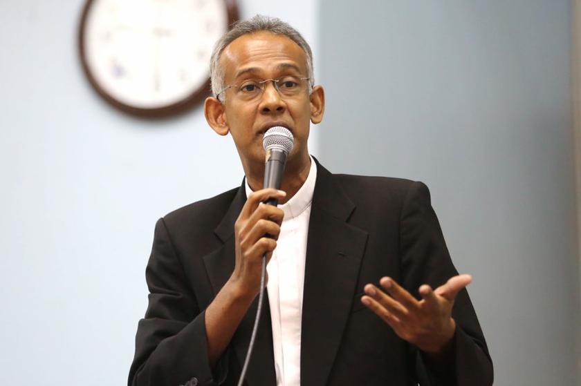 Director of the Archdiocesan Pastoral Institute Father Clarence Devadass speaks at a forum on freedom of religion in Petaling Jaya January 13, 2014. u00e2u20acu201d Picture by Choo Choy May