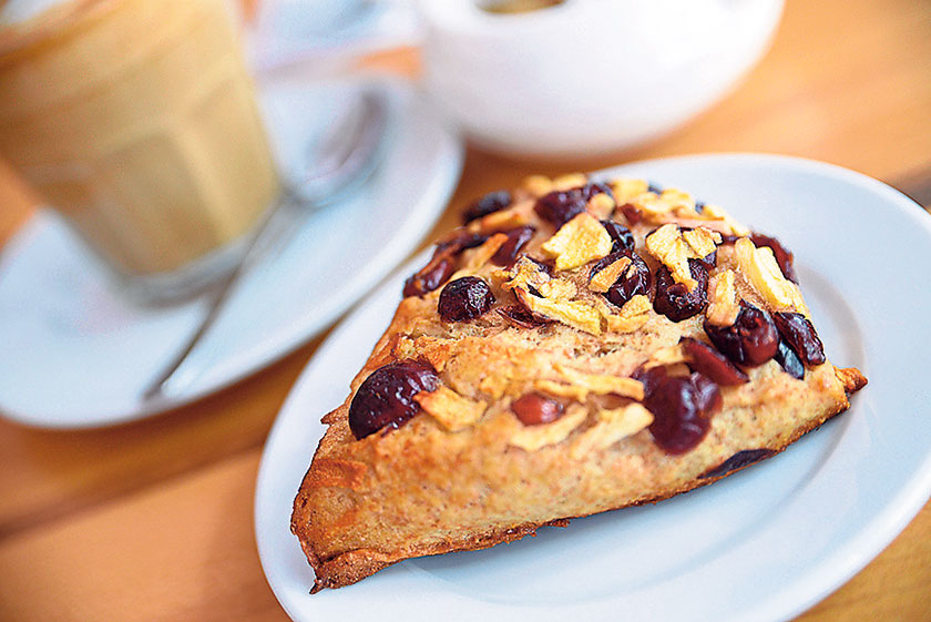 Sourdough scone topped with cranberries and walnut
