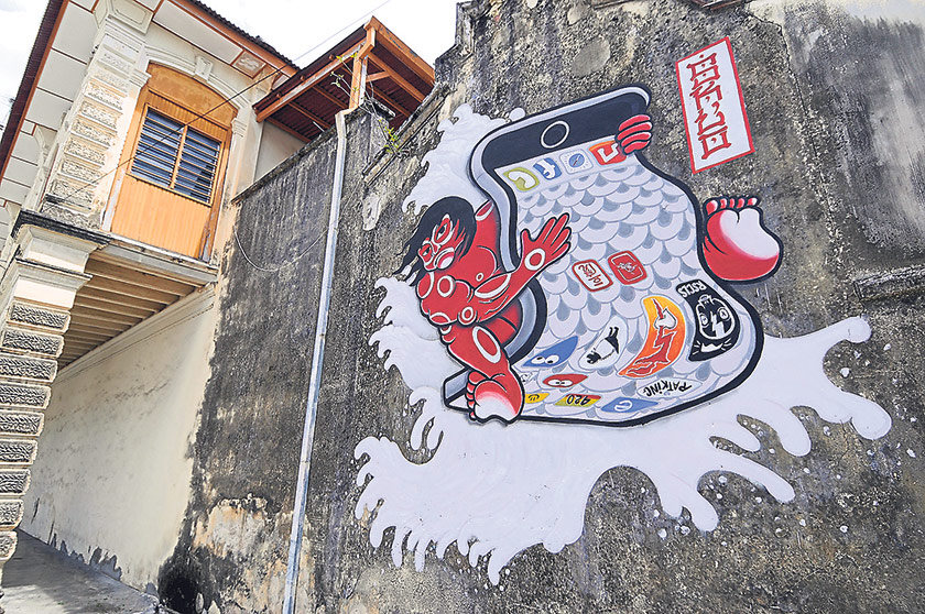 A mural by SKL0 along Nagore Road