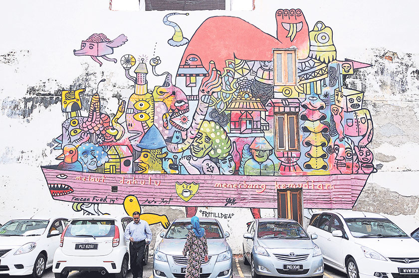 The colourful joint masterpiece by four local artists known as 4Some at a car park lot along Beach Street as part of the Urban Exchange art festival