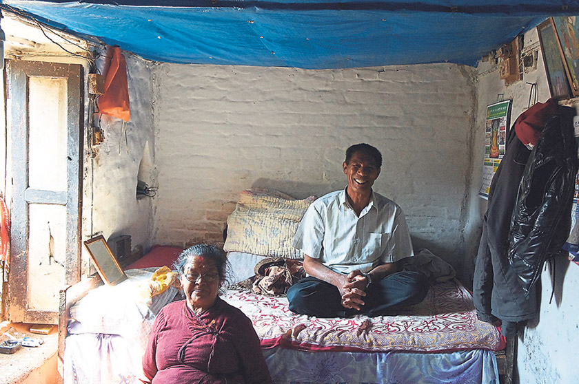 Babu’s parents inside their modest house