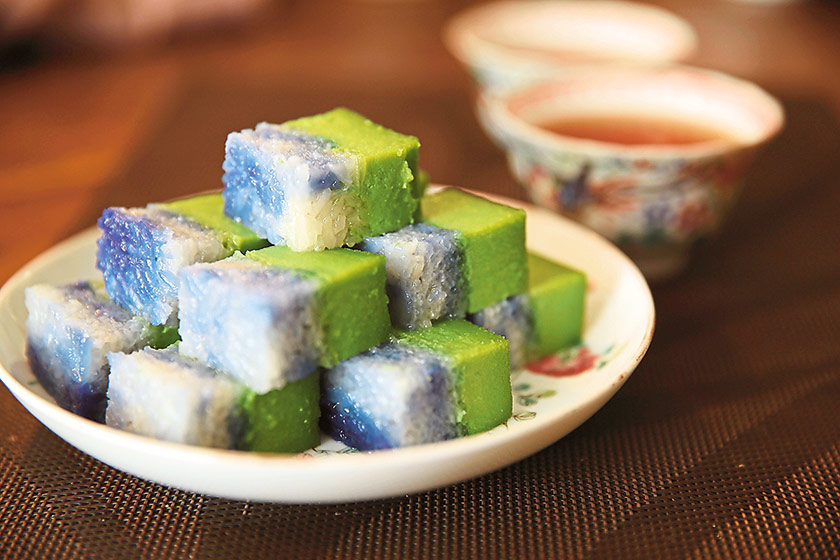 The double layered kuih seri muka marries blue and white coloured glutinous rice with an aromatic pandan flavoured custard.