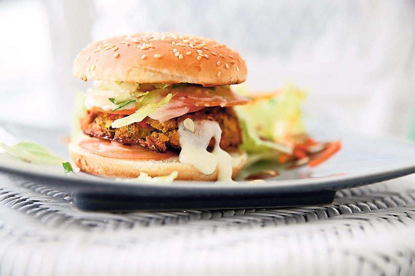 The vegan breakfast patty is filled with lots of vegetables like red pepper, broccoli and zucchini