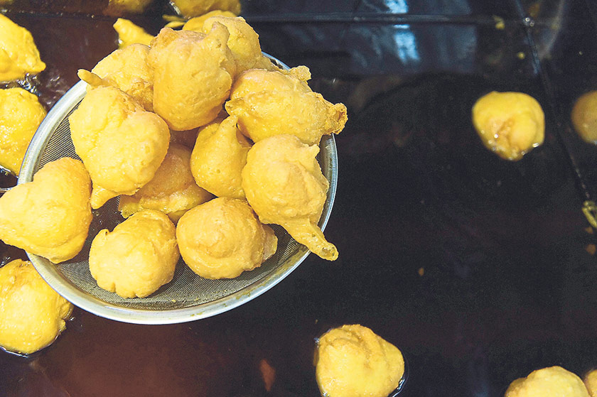 Expect the pastry to puff up in the hot oil.