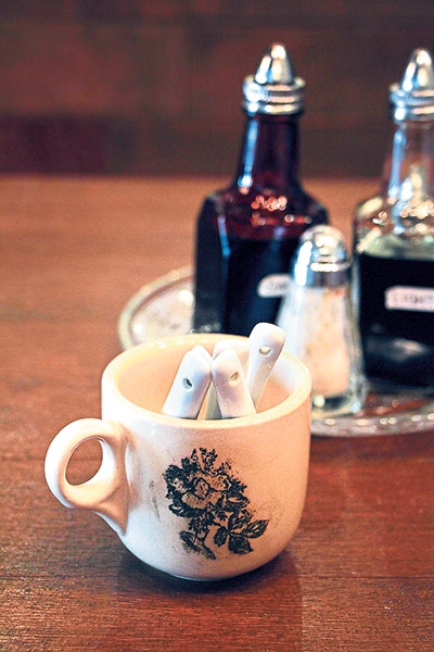 Old school kopitiam cups are used at Oriole Coffee Roasters