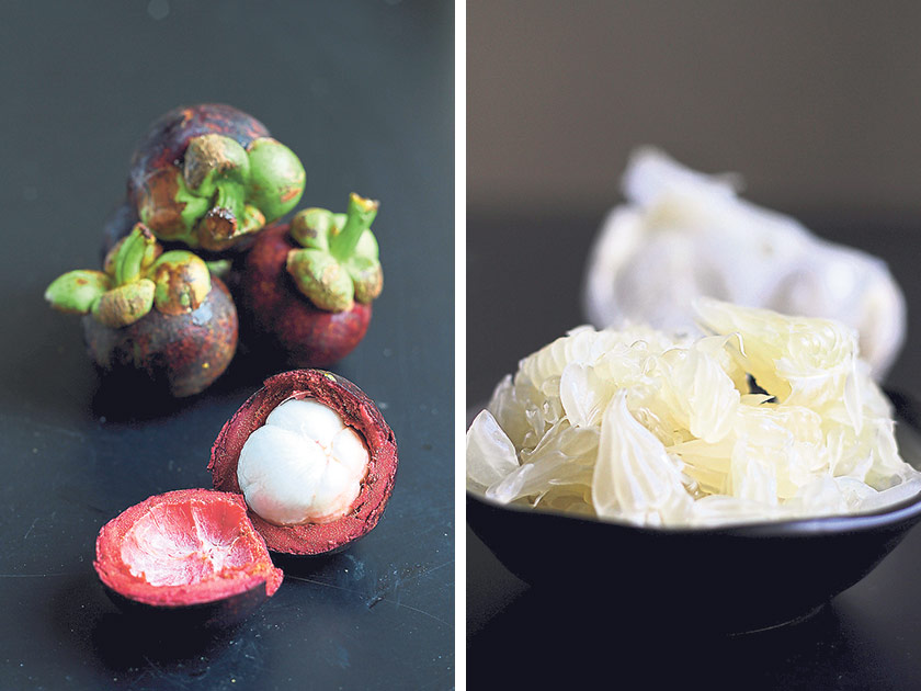 Tender segments of mangosteens (left). Juicy, tart and slightly bittersweet, pomelo has plenty of vitamins (right)
